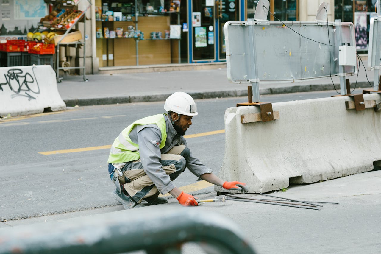 Mastering the First Impression: Your intriguing post title goes here A construction worker operates on a city street in Paris, France, showcasing urban development.